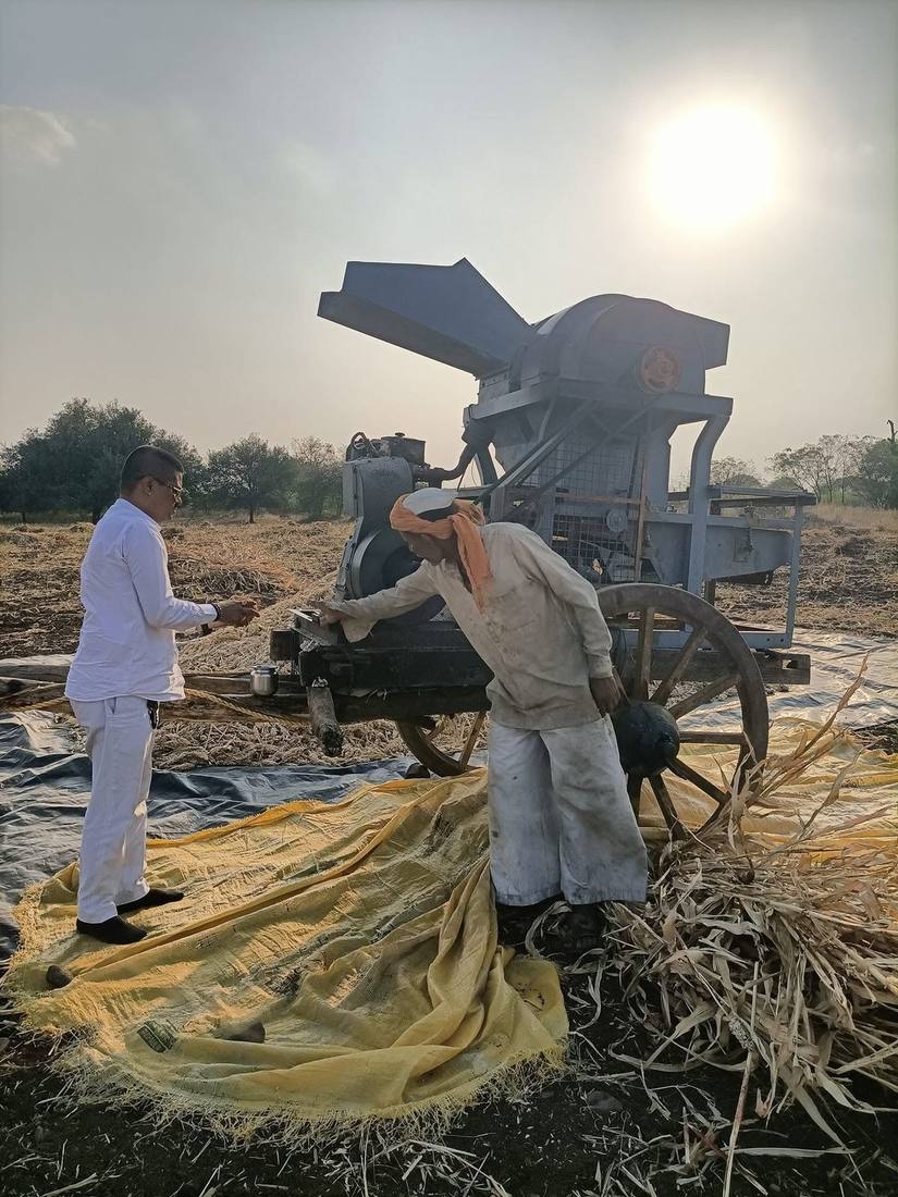 Traditional wood ghana oil press set up in a farmer's field